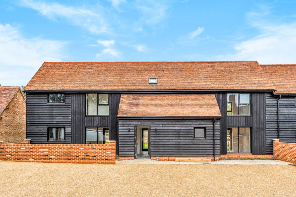Barn conversion stable painted brick and stained timber Stratford Upon Avon Warwickshire