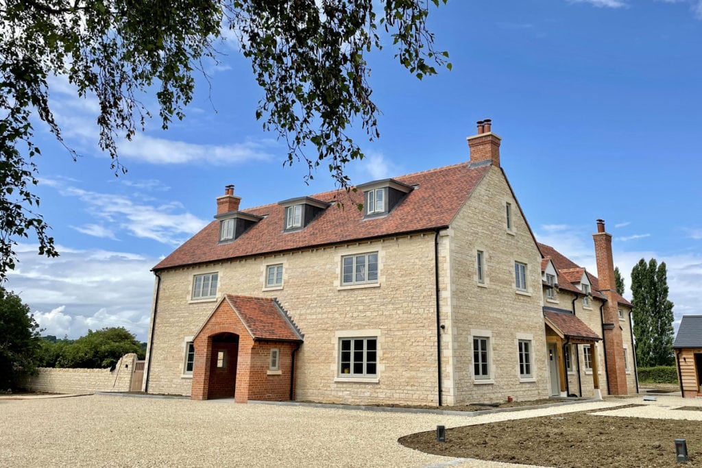 Oxfordshire new farmhouse, double fronted, brick porch, dormer windows